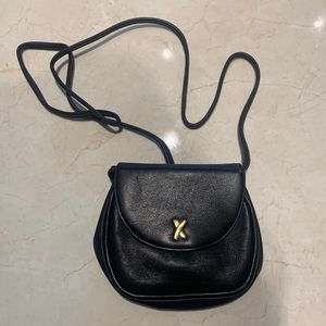Paloma Picasso black leather mini bag .  Made in Italy.  Can be worn on a belt.